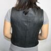 The back view of a woman wearing a Women Genuine Soft Cowhide Black Zipper Closure with Spandex on the side Vest.