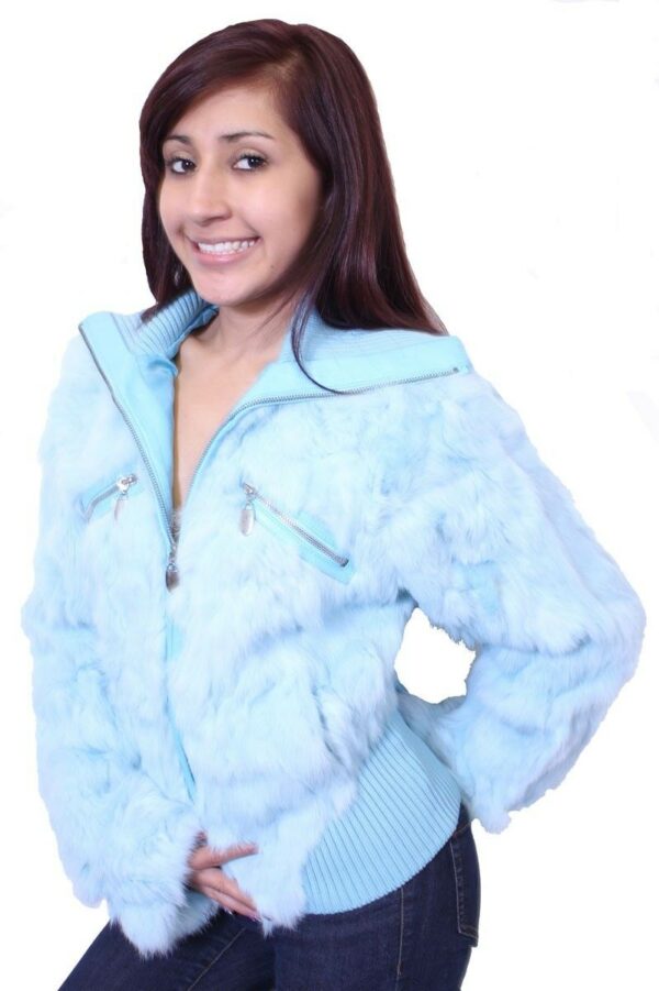 A Women's Rabbit Fur With Leather Trim/Knitting Rib Jacket Blue Special in a blue fur jacket posing for a photo.