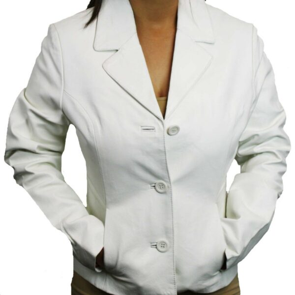 A woman wearing a Women's Soft Genuine White Leather Short Buttons Closure Fitted Jacket Style and tan pants.