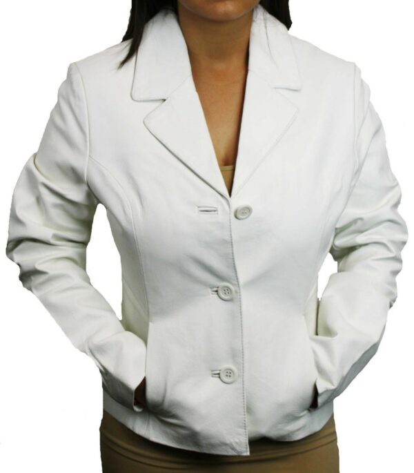 A woman wearing a Women's Soft Genuine White Leather Short Buttons Closure Fitted Jacket Style and tan pants.