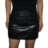 A woman wearing a Genuine Leather Ladies Mini 14" Skirts Back Zipper Closure - Best Fitted skirt.