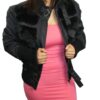 A woman in a pink dress wearing a Women's Rabbit Fur with Trim/Knitting Rib Jacket Black Special.