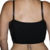 A woman wearing a Women Halter Top Black Genuine Leather FREE SHIPPING STYLE #561LM with a tattoo on her back.