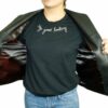 A woman wearing a black t-shirt and Cute Lightweight Black Zip-Up Genuine Napa Leather Two Pockets Jacket PN 319.