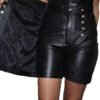 A woman in Womens Genuine Lamb Leather Skort.