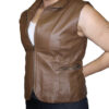 A woman wearing a Women Vest Black Or Brown Genuine Soft Napa Leather Zipper closure Nice Fit 3019.