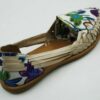 A pair of Ladies Genuine Authentic Mexican Leather Flower Print Closed Toe Flat Sandals-1 with a floral pattern.