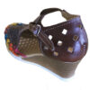 A pair of Women Genuine Leather Espadrille Wedges Mexican Sandals with Flower Paint with a colorful pattern.