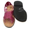 A pair of Ladies Genuine Authentic Soft Leather Mexican Sandal Style Silvia - Pink and black.