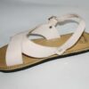 A pair of MEXICAN Men's Genuine Cowhide Natural Leather Quality Handmade Sandals on a white surface.