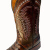 A pair of Men's Genuine Cowhide Coco Belly Print Leather Square Toe Boots Handcrafted with crocodile skin.